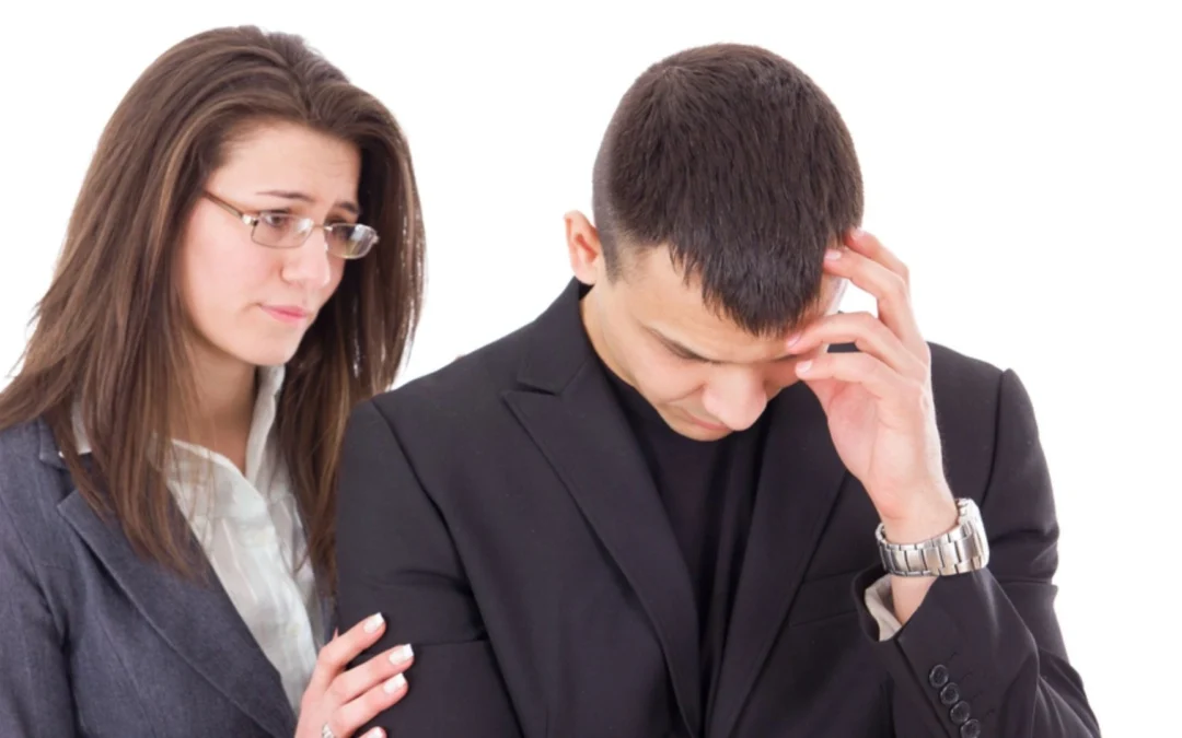 one person reassuring another person