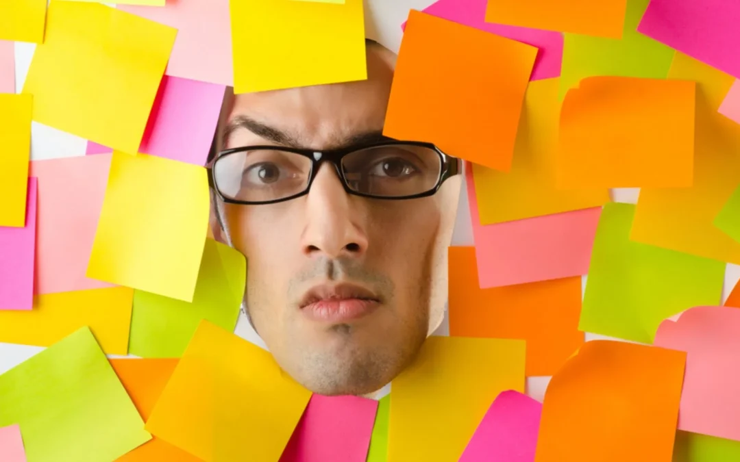 person's face covered with post-it notes