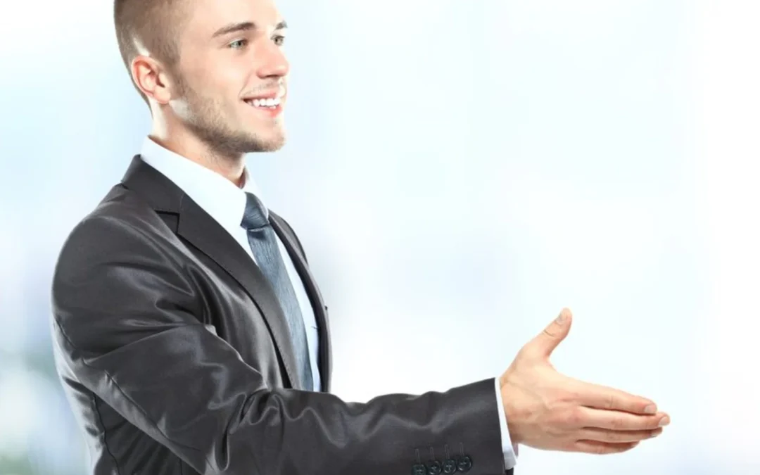 Person holding out hand to shake