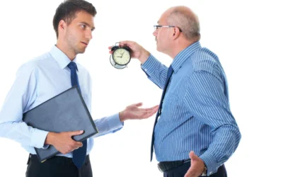 boss holding up clock and reprimanding employee