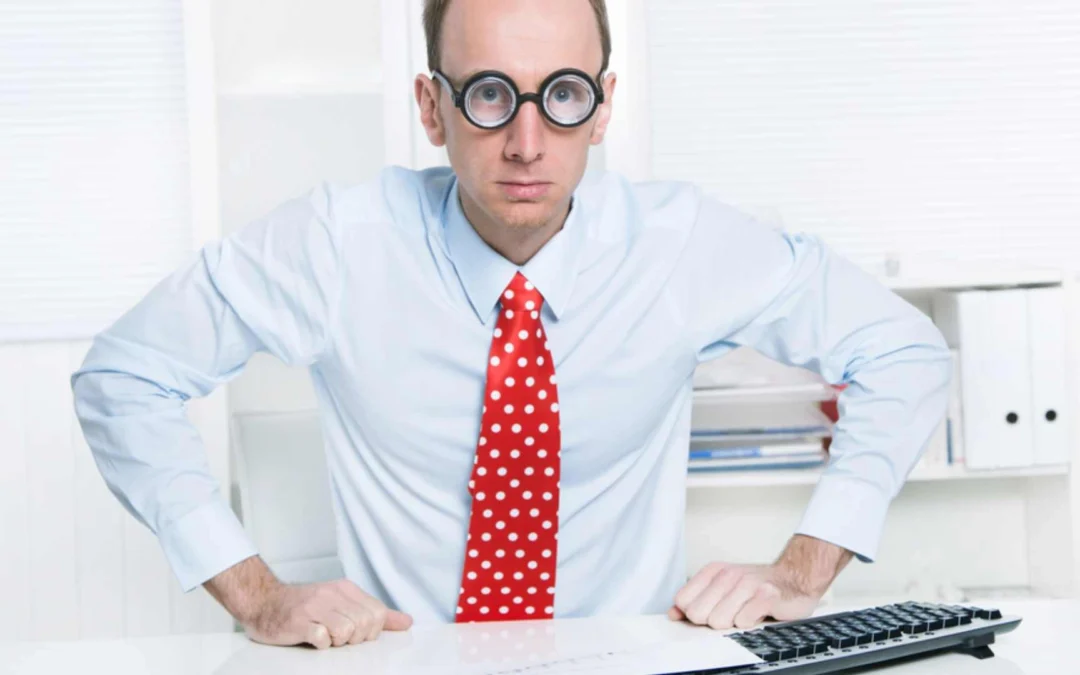 person wearing thick glasses