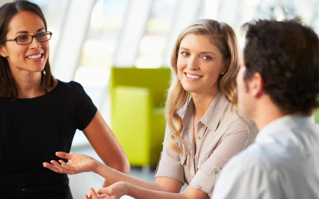 group of team members having a conversation