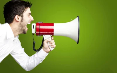 person yelling into a bullhorn