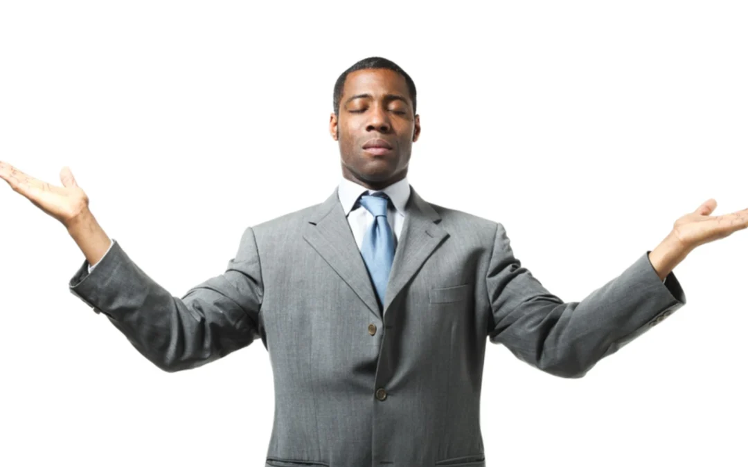 Person with eyes closed and arms wide open