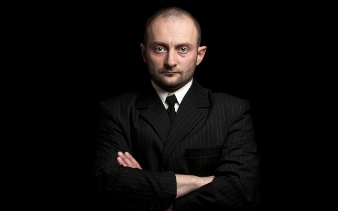 person standing with arms crossed