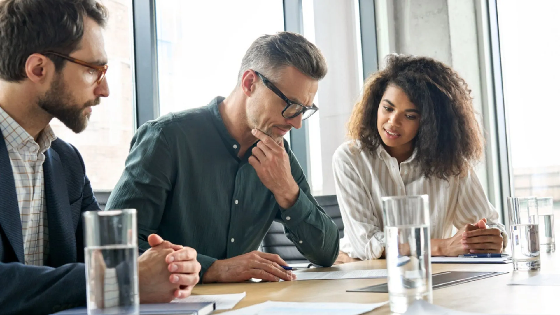 person standing in front of a blackboard