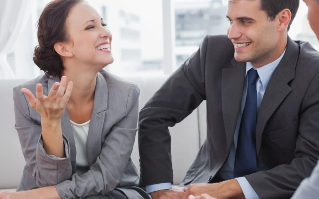 two team members conversing