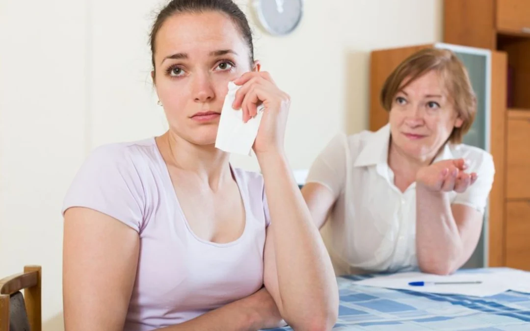 boss talking to a person who is crying