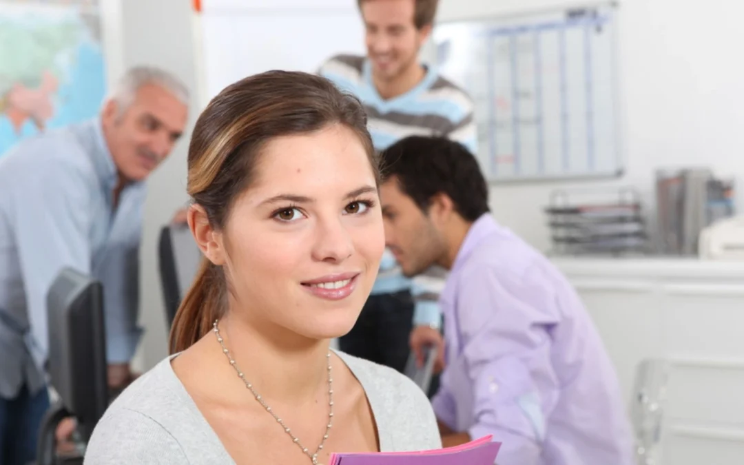young person holding a file folder