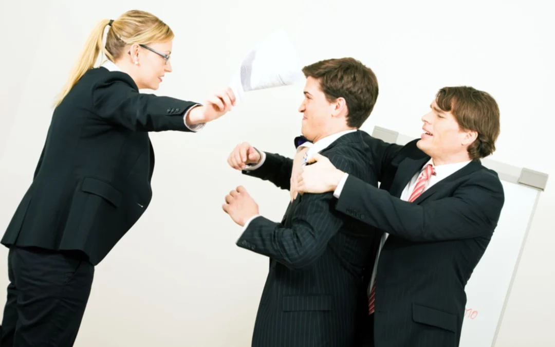 person trying to break up a fight