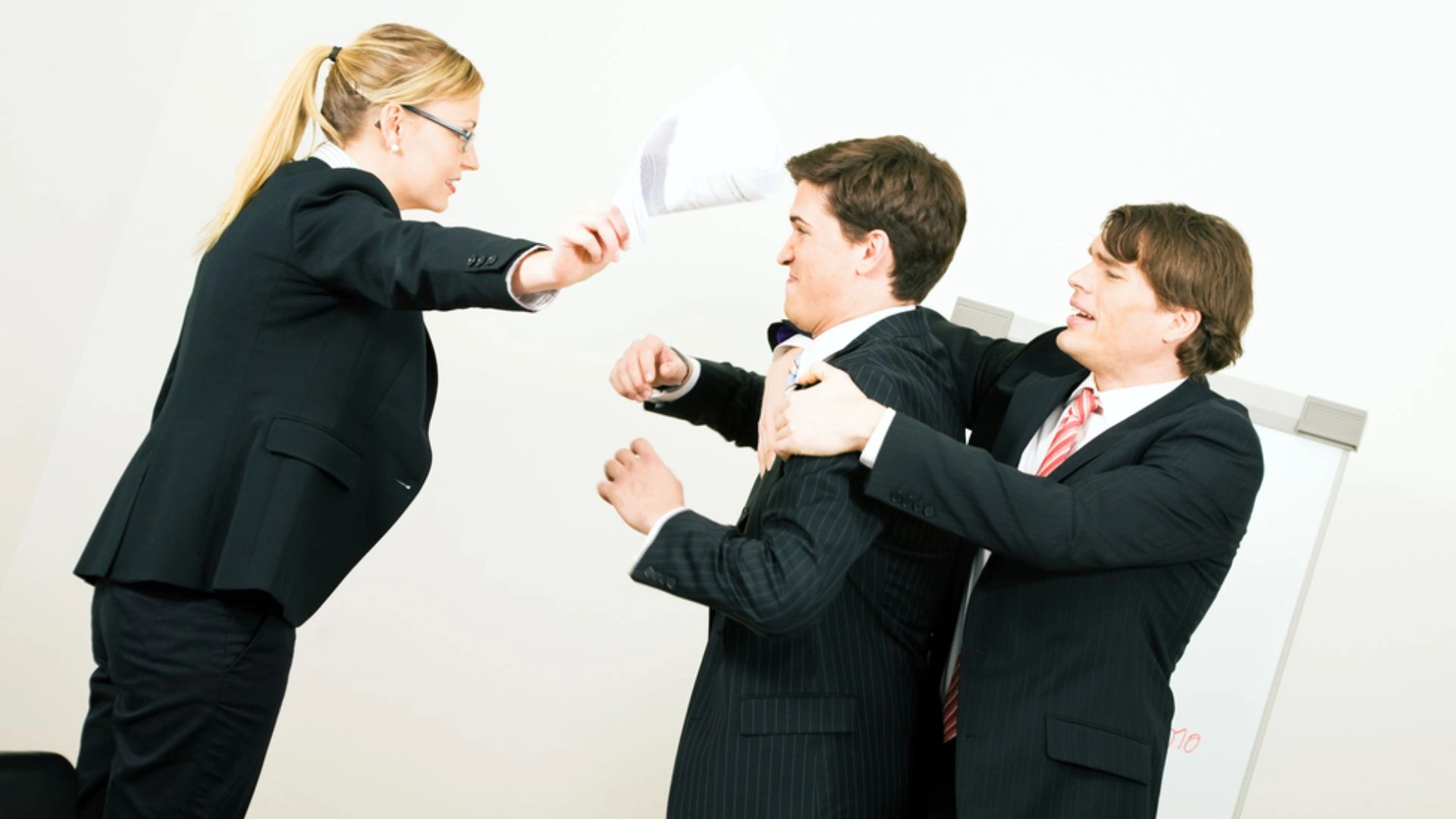 person trying to break up a fight