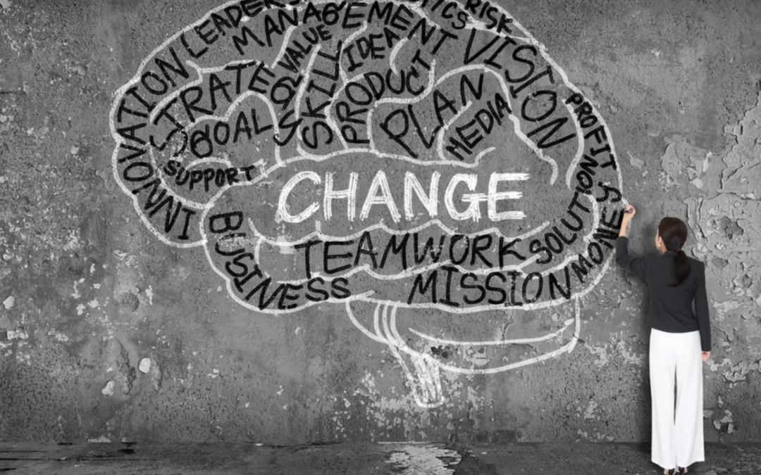 person drawing a chalk outline of a brain