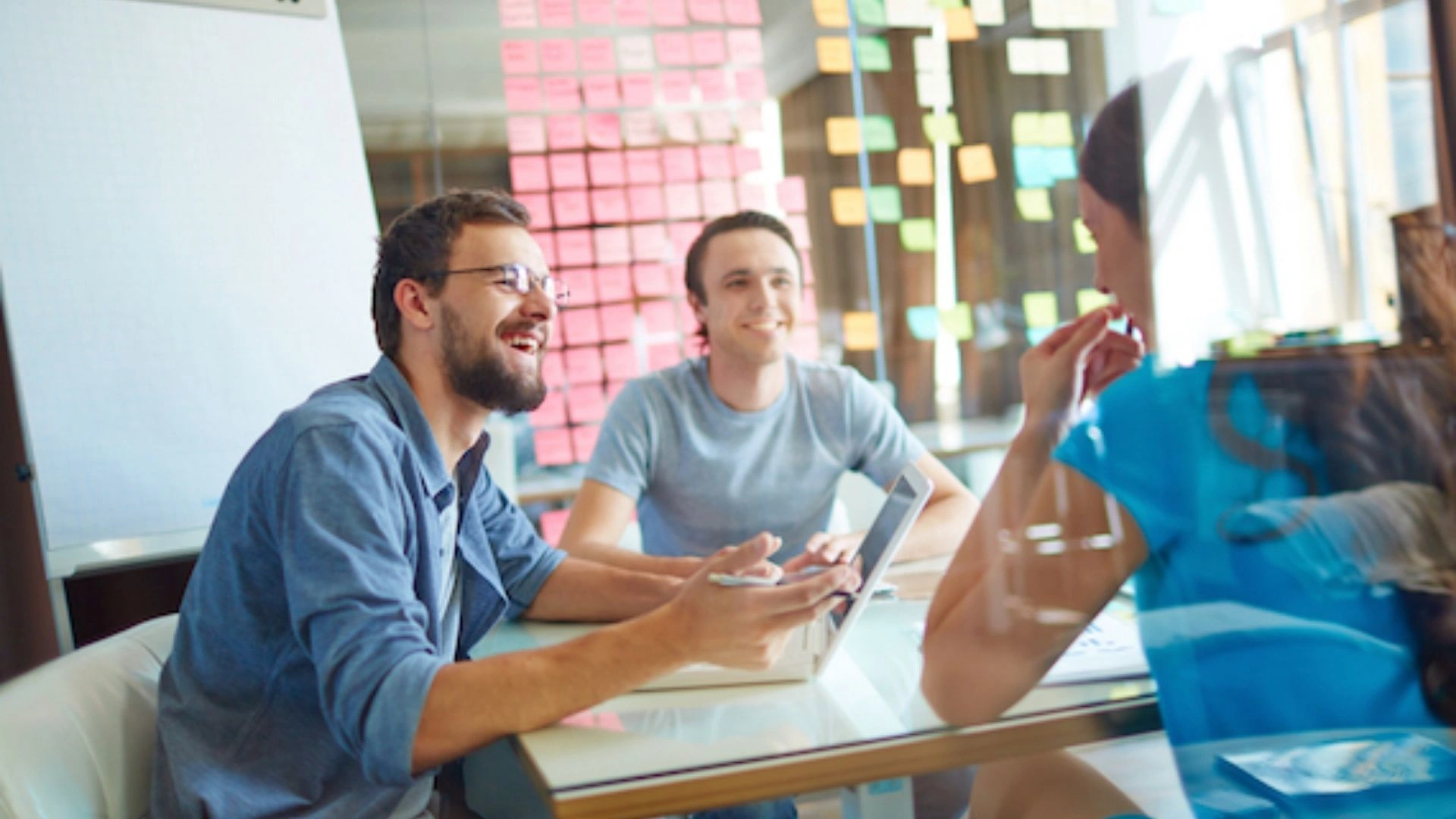 Group of people sitting around a table