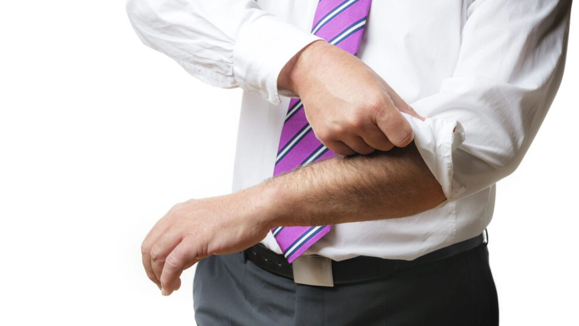 Person rolling up their sleeves