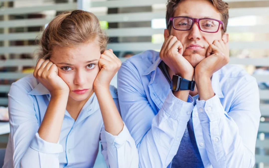 Two people looking bored and lazy