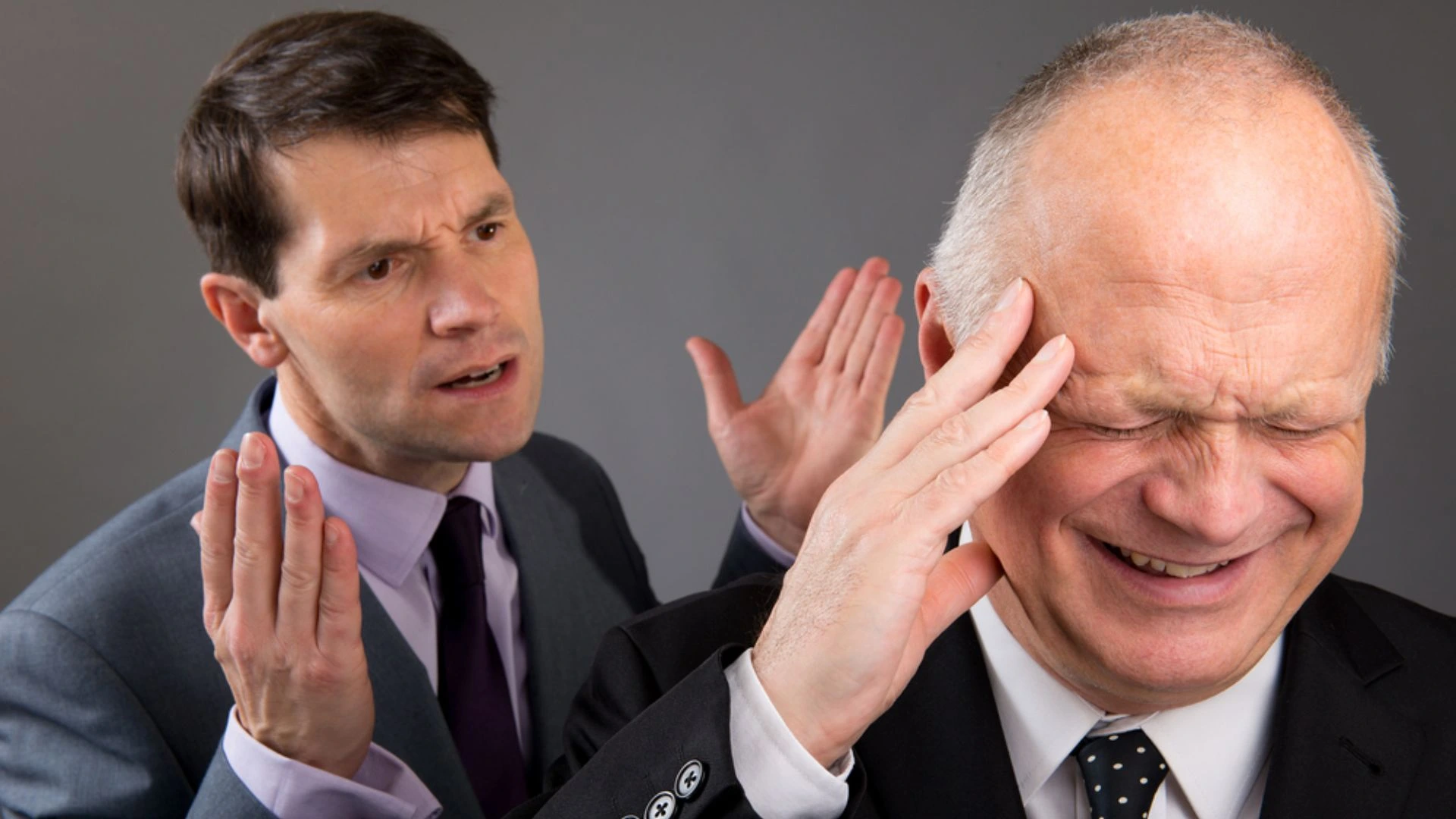 Person having difficult conversation that other person doesn't want to hear