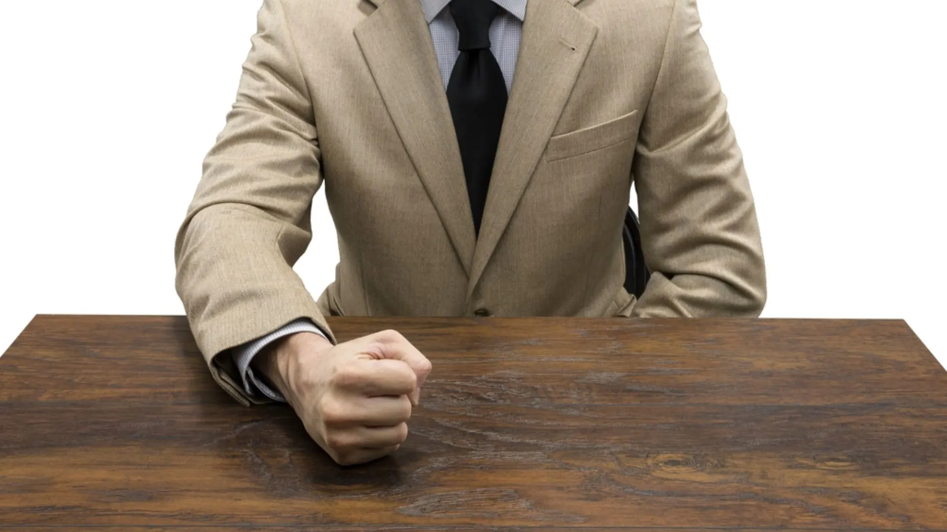 Person pounding fist on desk