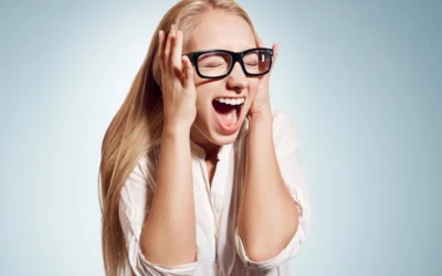 Person grabbing head and screaming in frustration