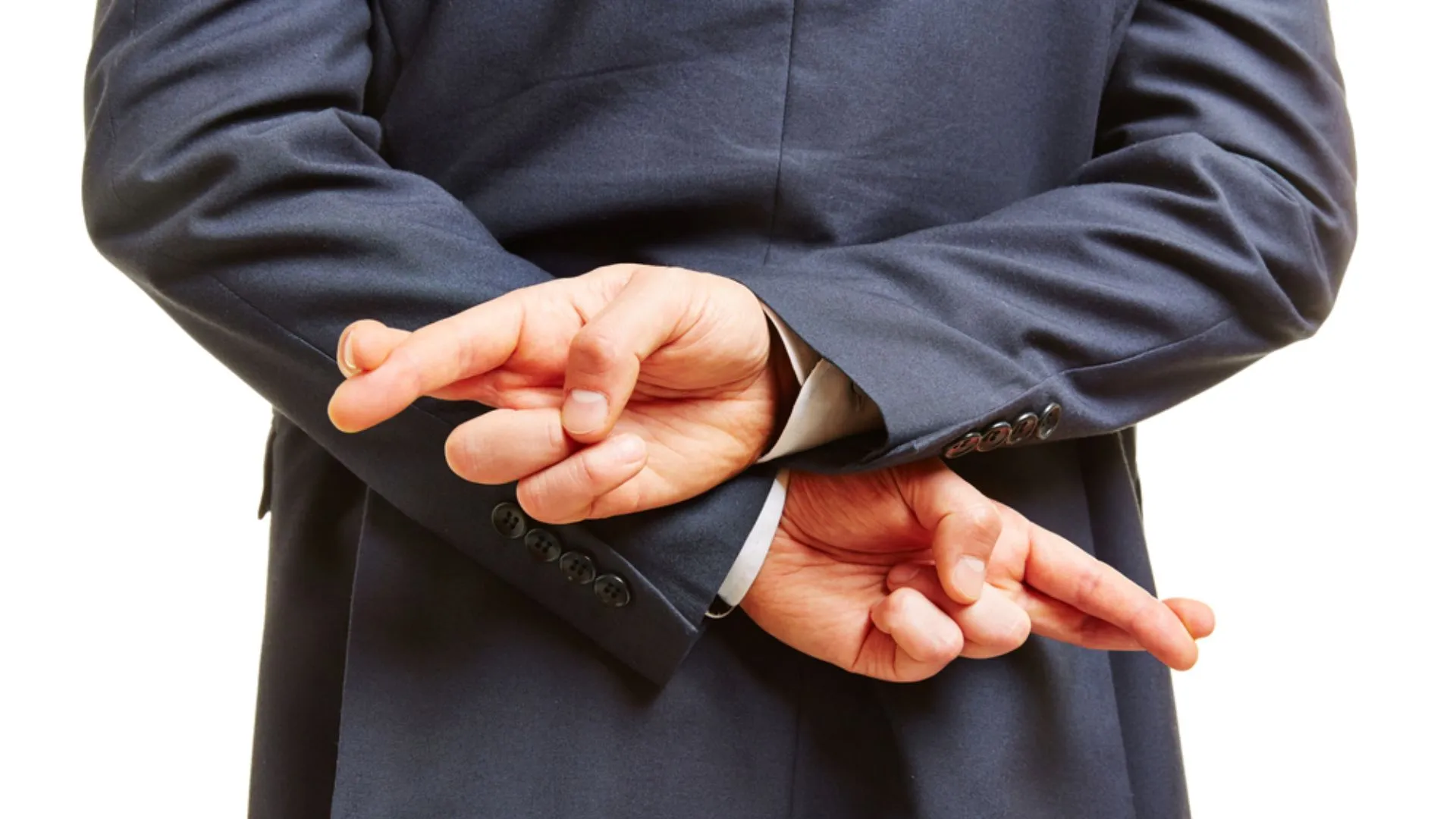 Person with fingers crossed behind back