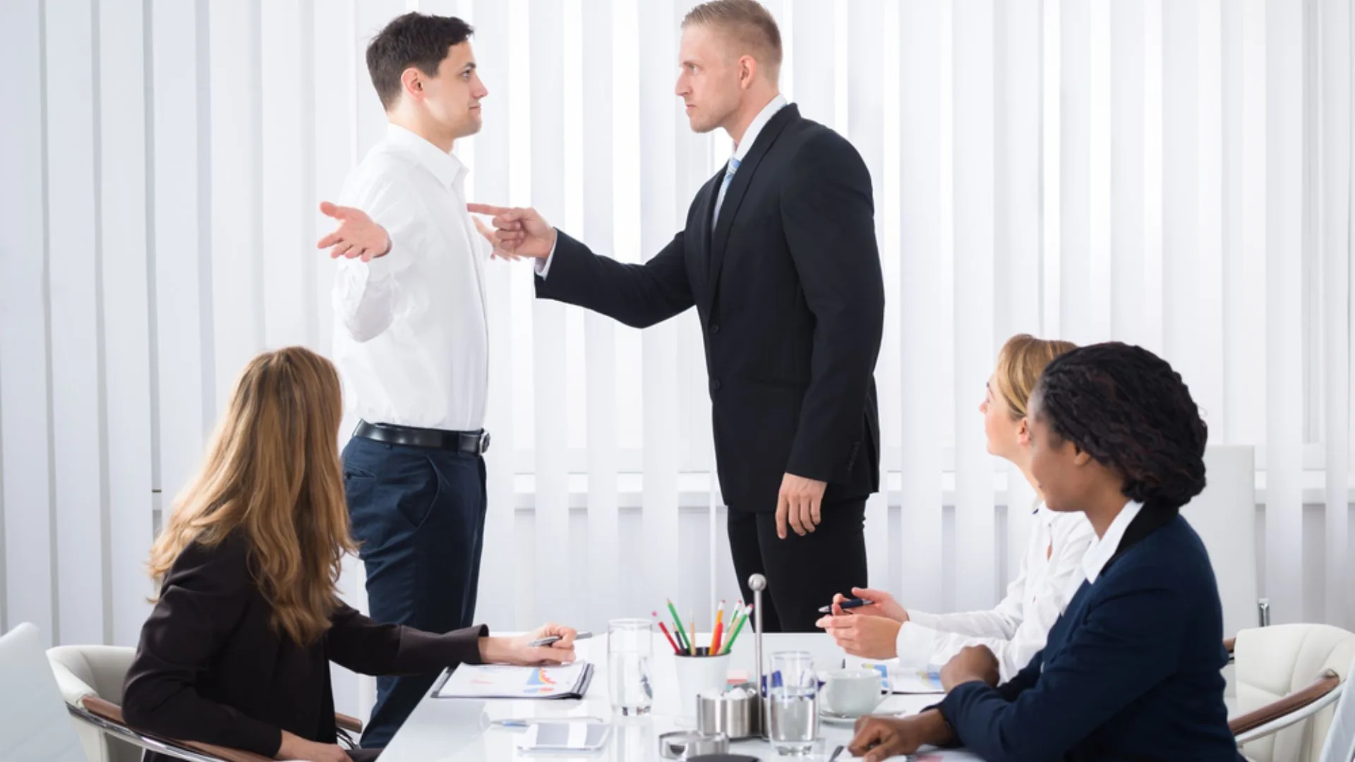 Person bullying teammates in a meeting