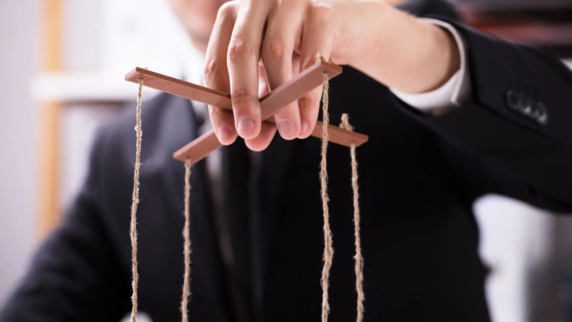 Person controlling another person like a puppet