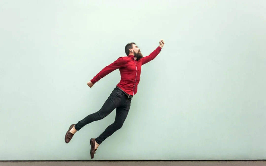 Business person pretending to fly