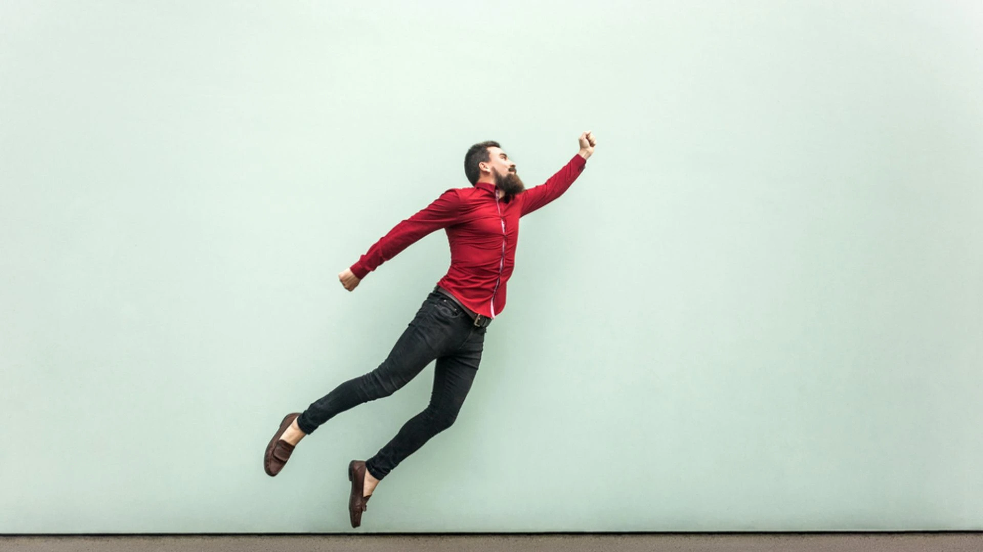 Business person pretending to fly