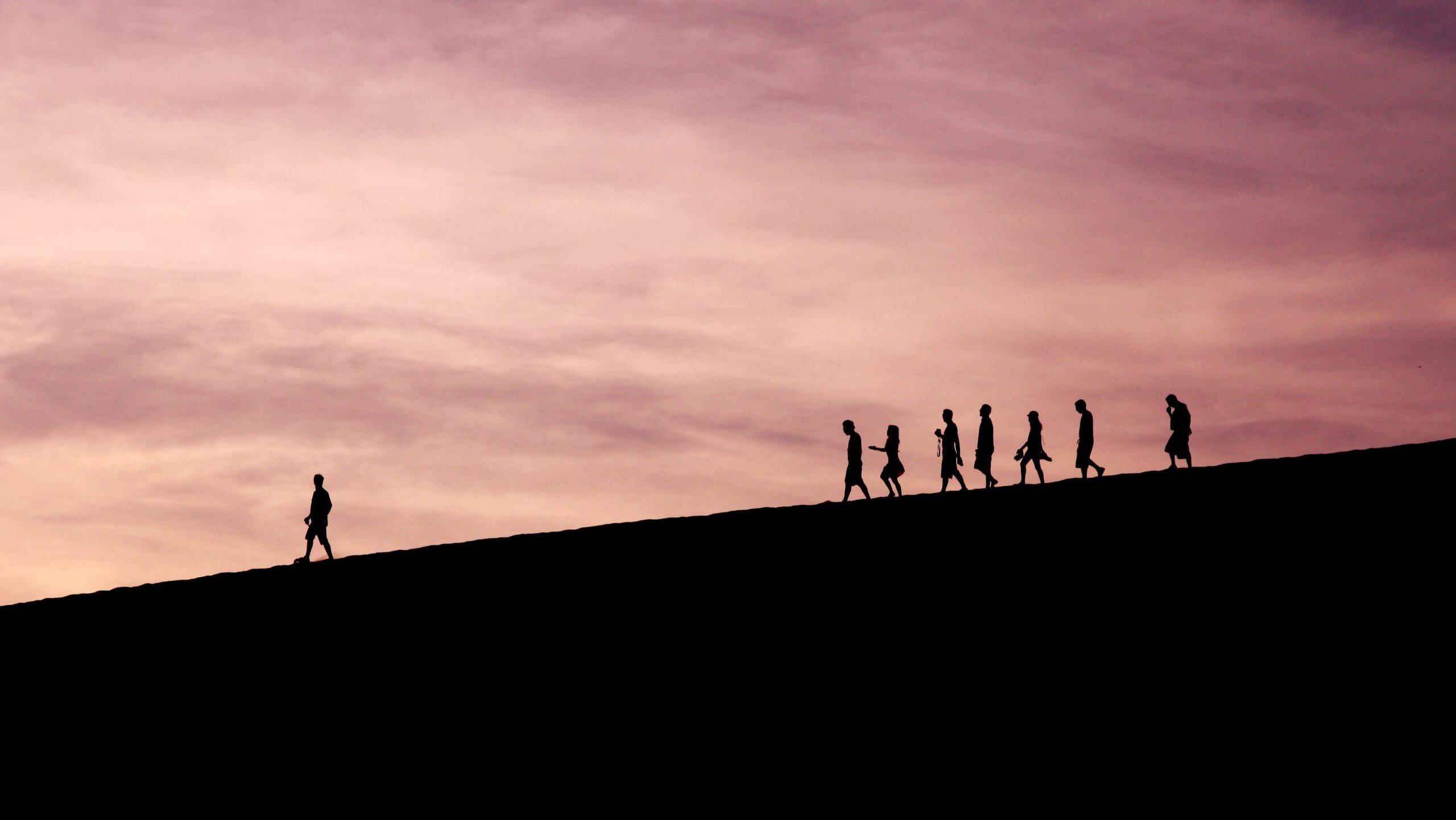 A leader leading a team down a hill
