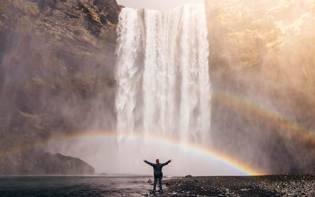 Rainbow over a waterfall