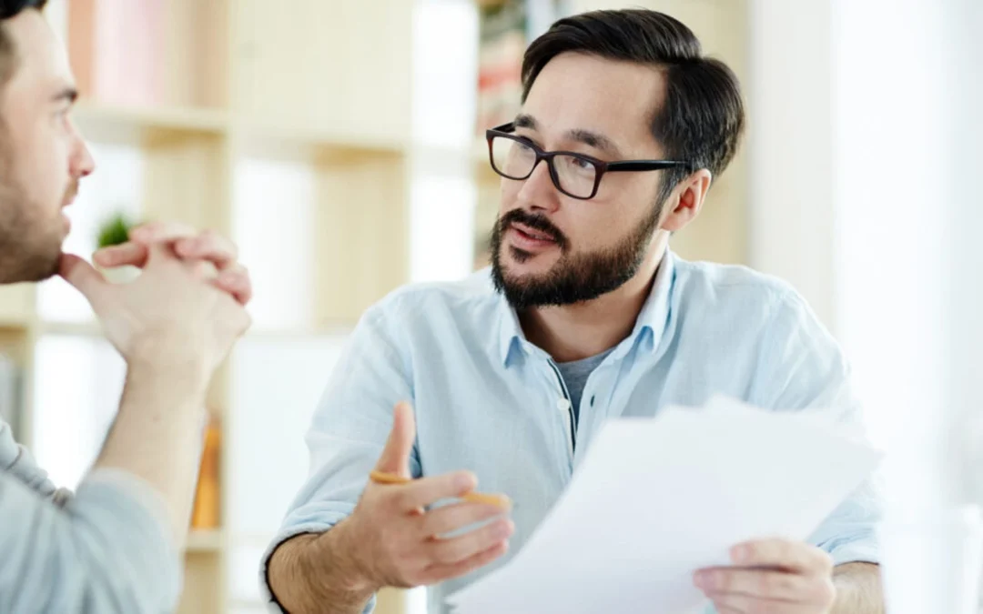 Manager and employee speaking