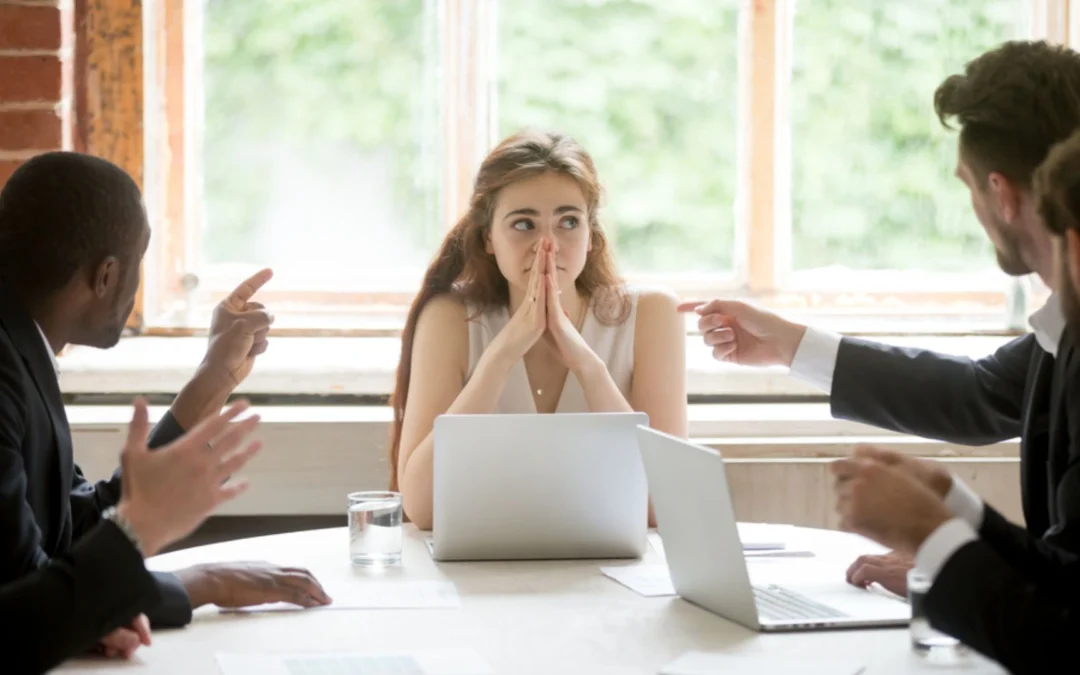 Person rolling eyes at someone in a meeting