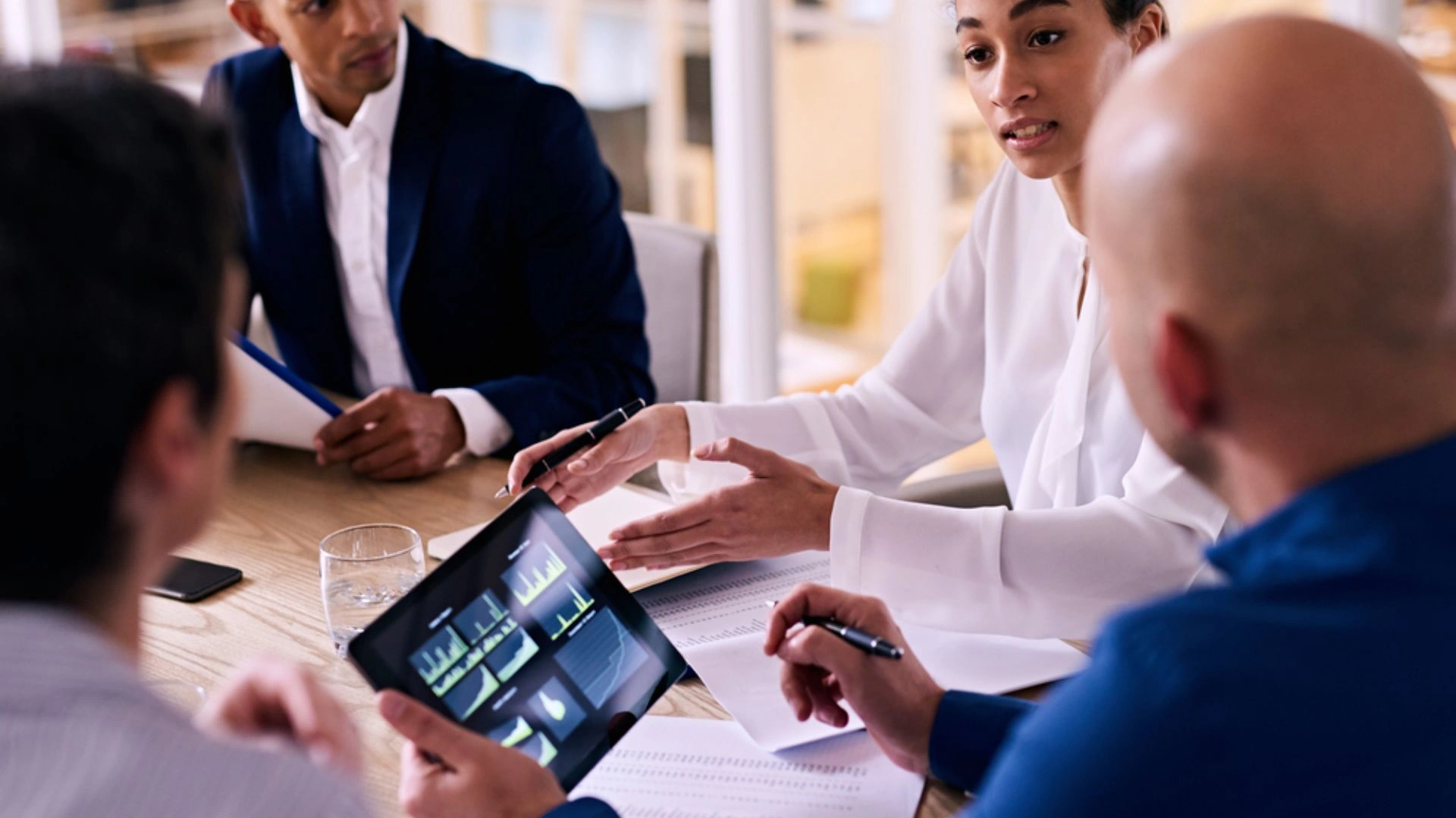 Team sitting around a meeting table