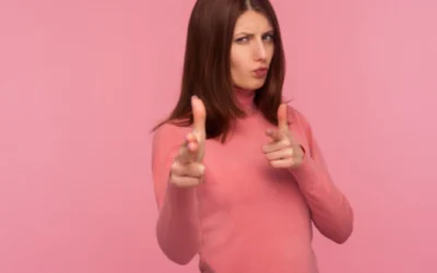 Woman shooting finger guns