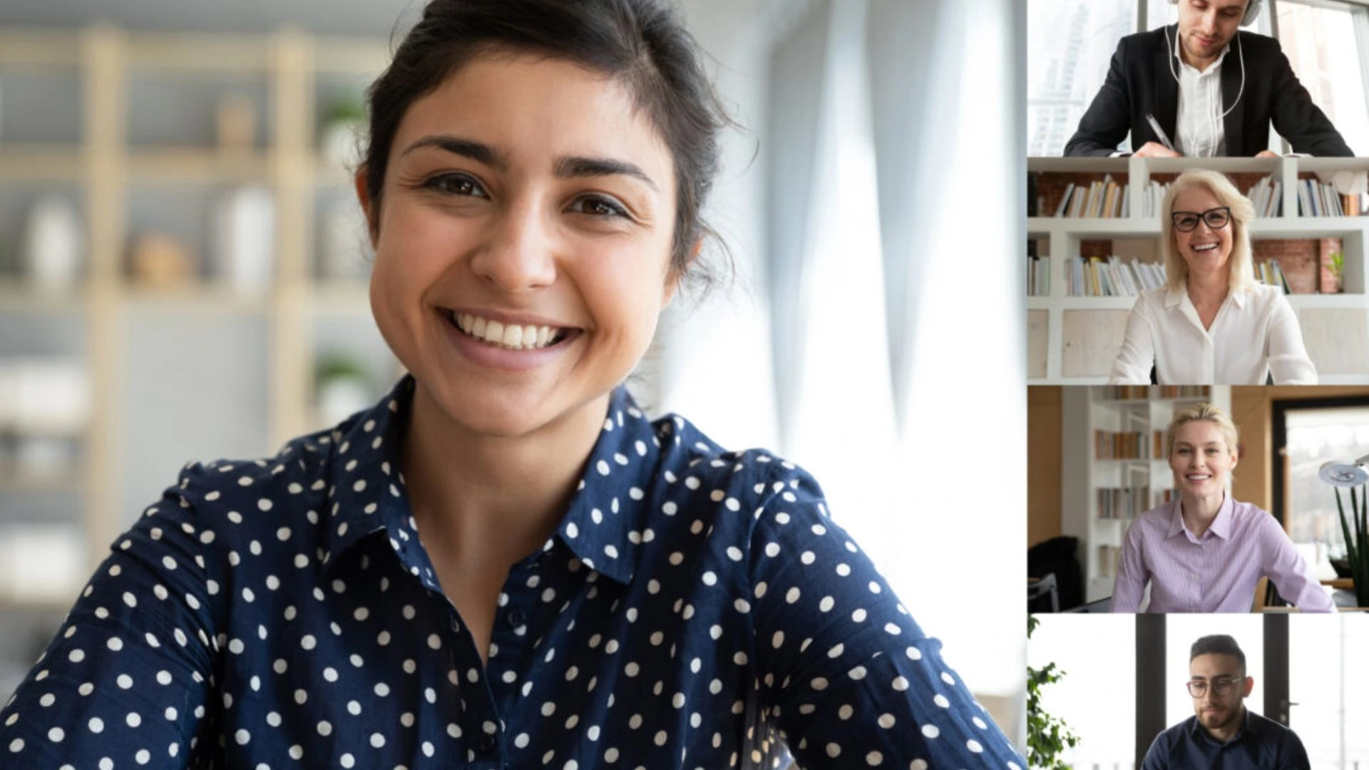 Woman and four colleagues on video conference screen