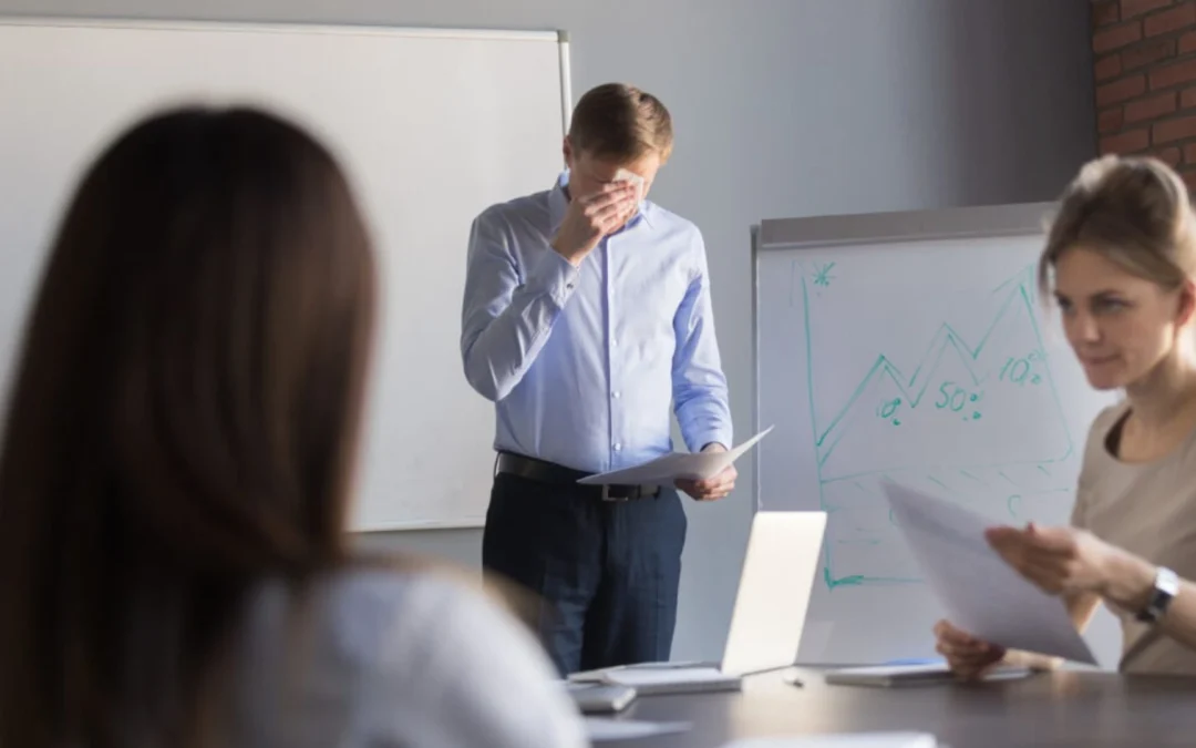 Team meeting where one team member looks nervous