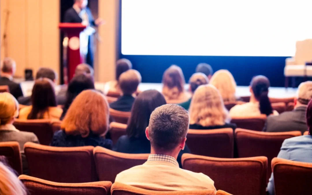 Large corporate meeting in a auditorium