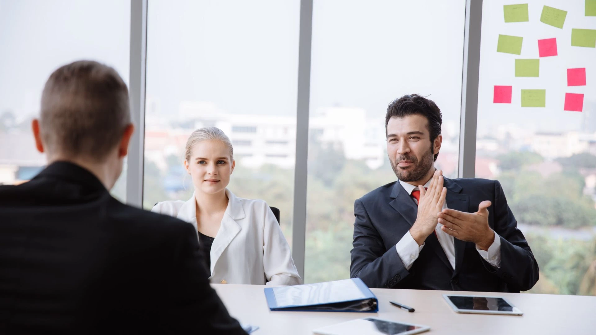 Person pitching an idea in a meeting
