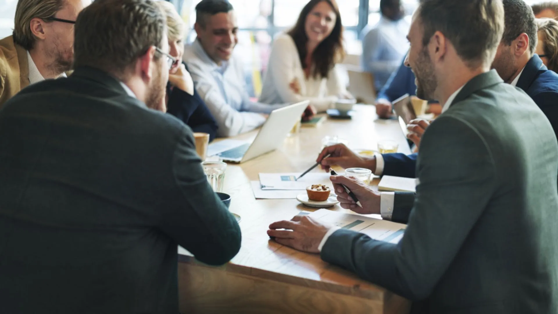 Team of people around a meeting table