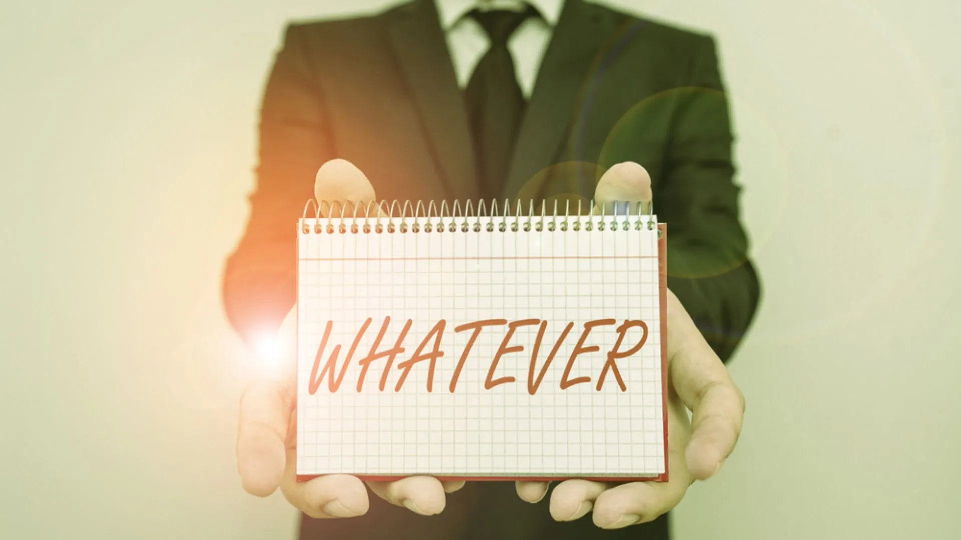 Person holding a sign that says