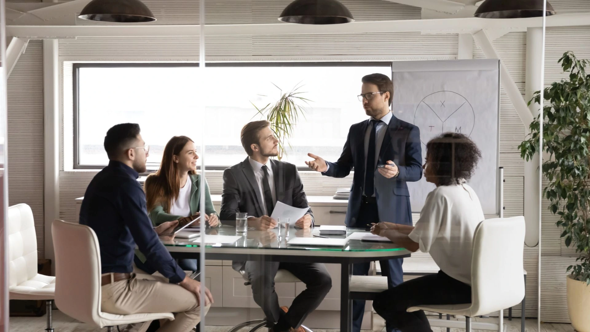 Team of people in suits doing strategic planning
