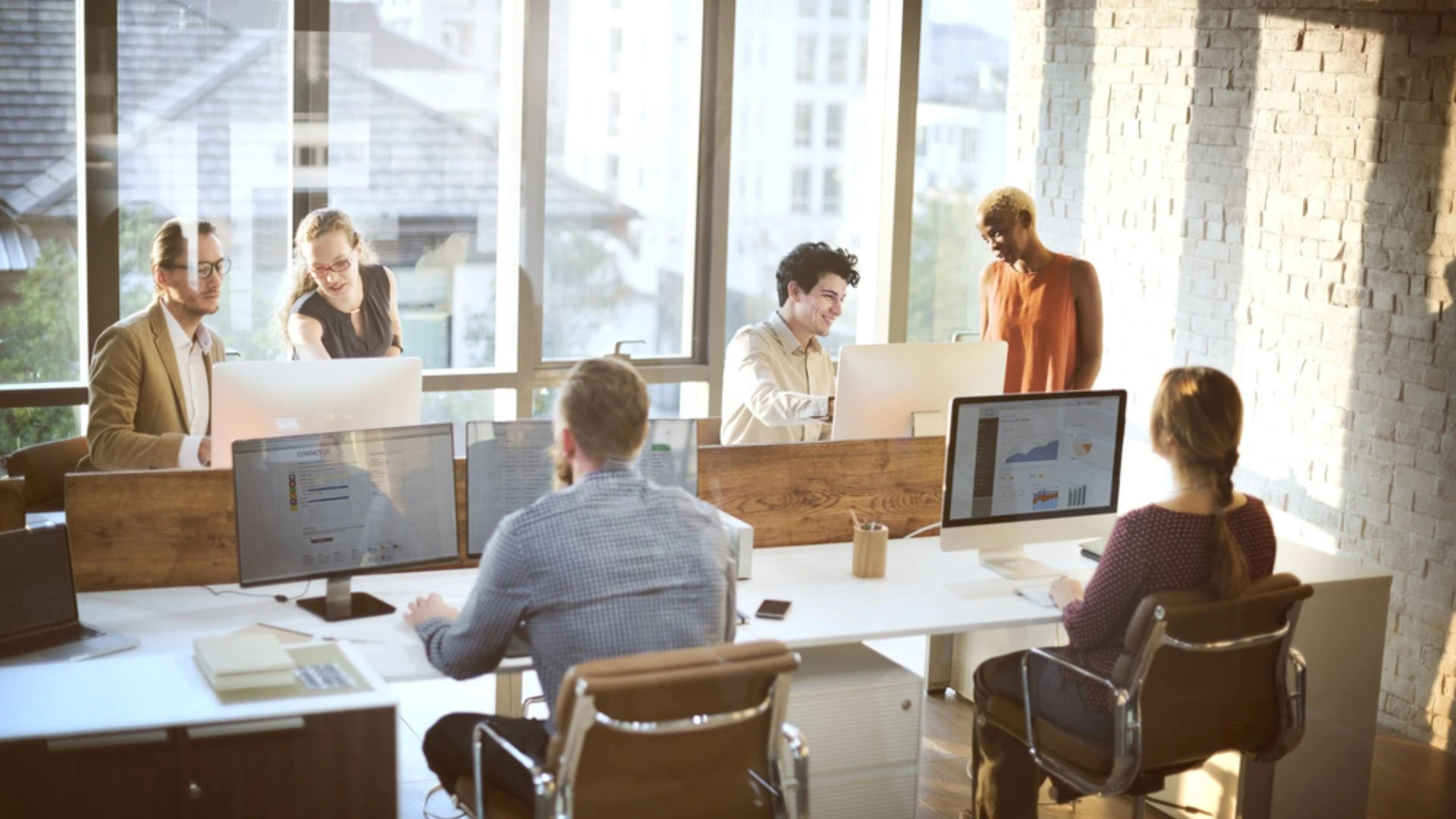 Start up team all working in a small shared space