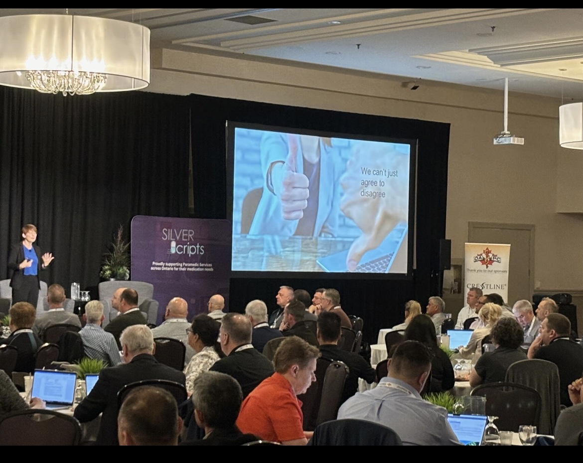 Liane Davey speaking in front of the OAPC Spring Symposium