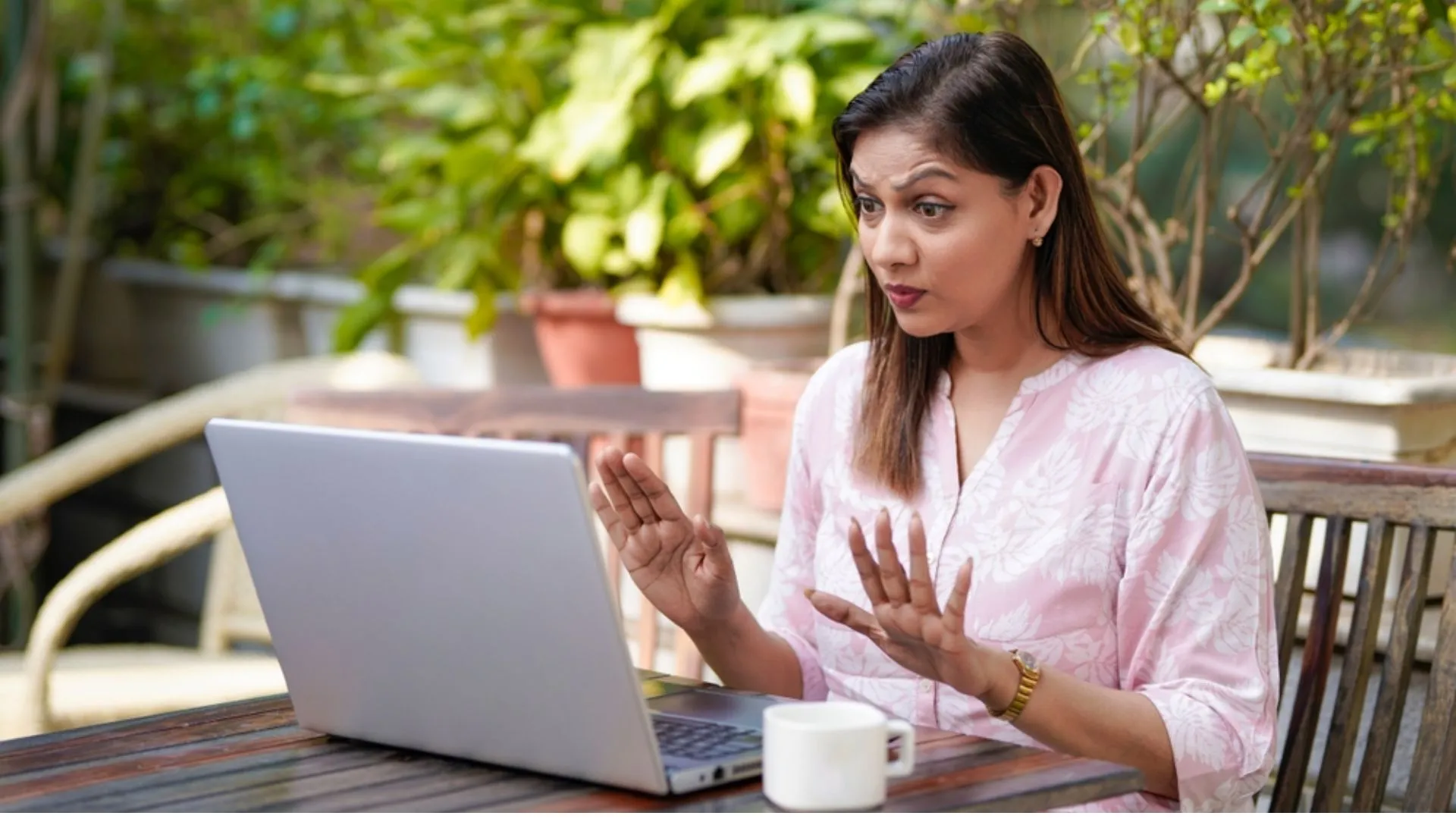 Woman working remotely and saying